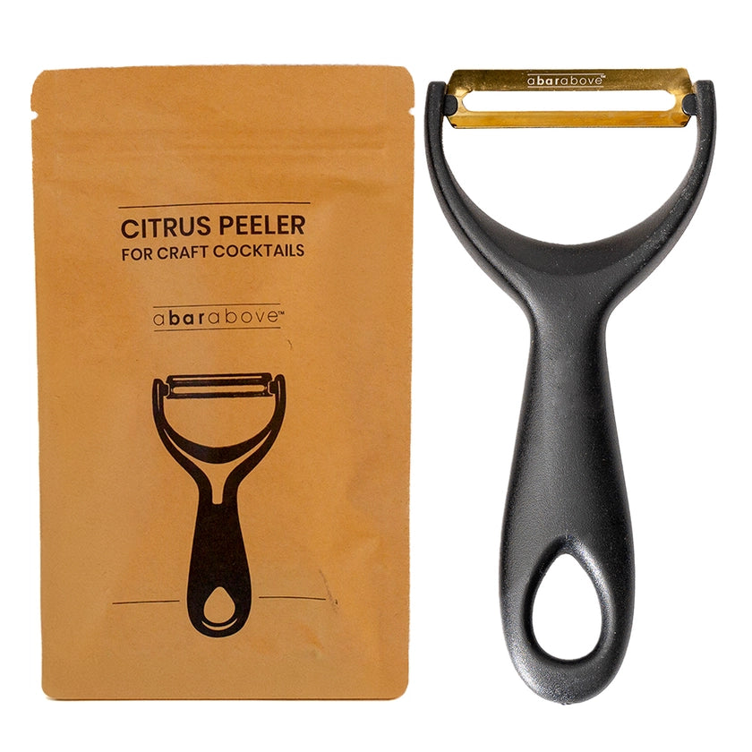 Citrus peeler with packaging labeled 'abaraabove' on a white background